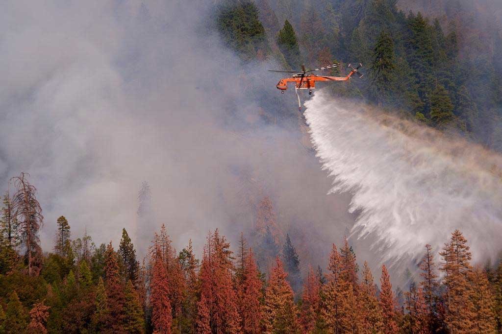 Type 1 Helicopter Conducting a Drop Supporting Ground Operations, 2015 Willow Fire, Credit: Dennis Rein